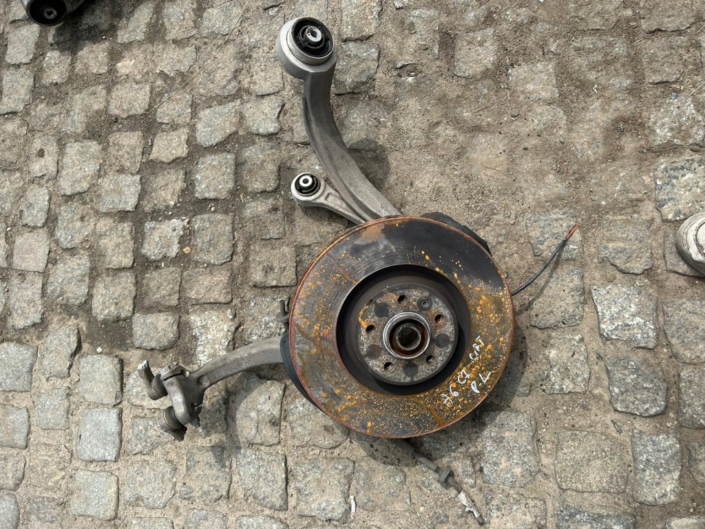 фото №1, Audi a6 c7 поворотный кулак mcperson левый перед 3.0 tdi