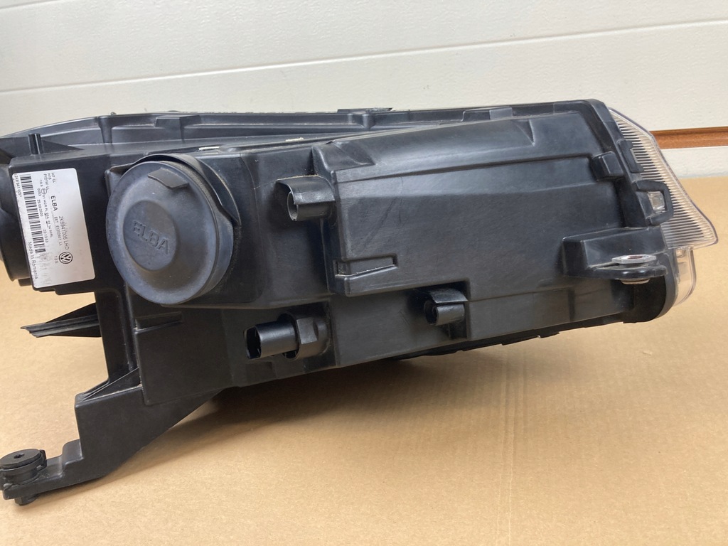 фото №10, Лампа ліва передня vw caddy 2k8