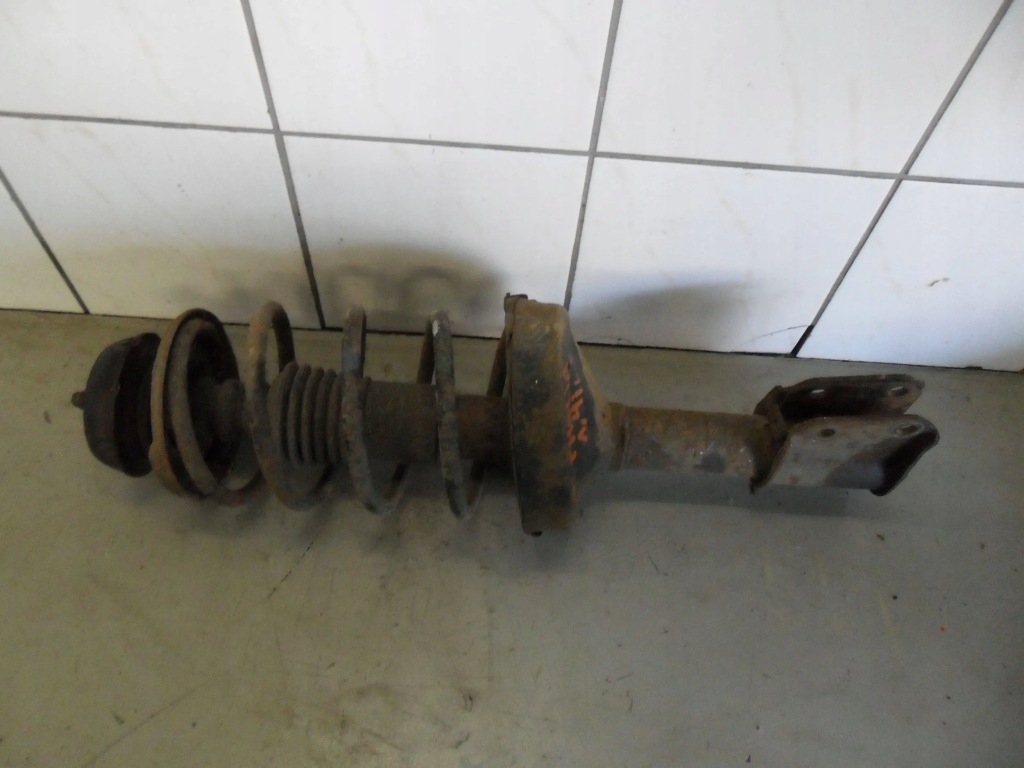 фото №1, Renault thalia i 2004 1.4 b амортизатор ze пружина амортизаторна стійка лівий перед