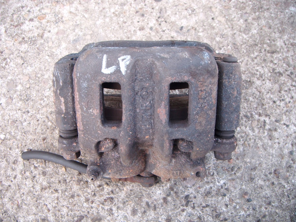 фото №1, Grandis 03-11 2.4 суппорт тормозной левый перед