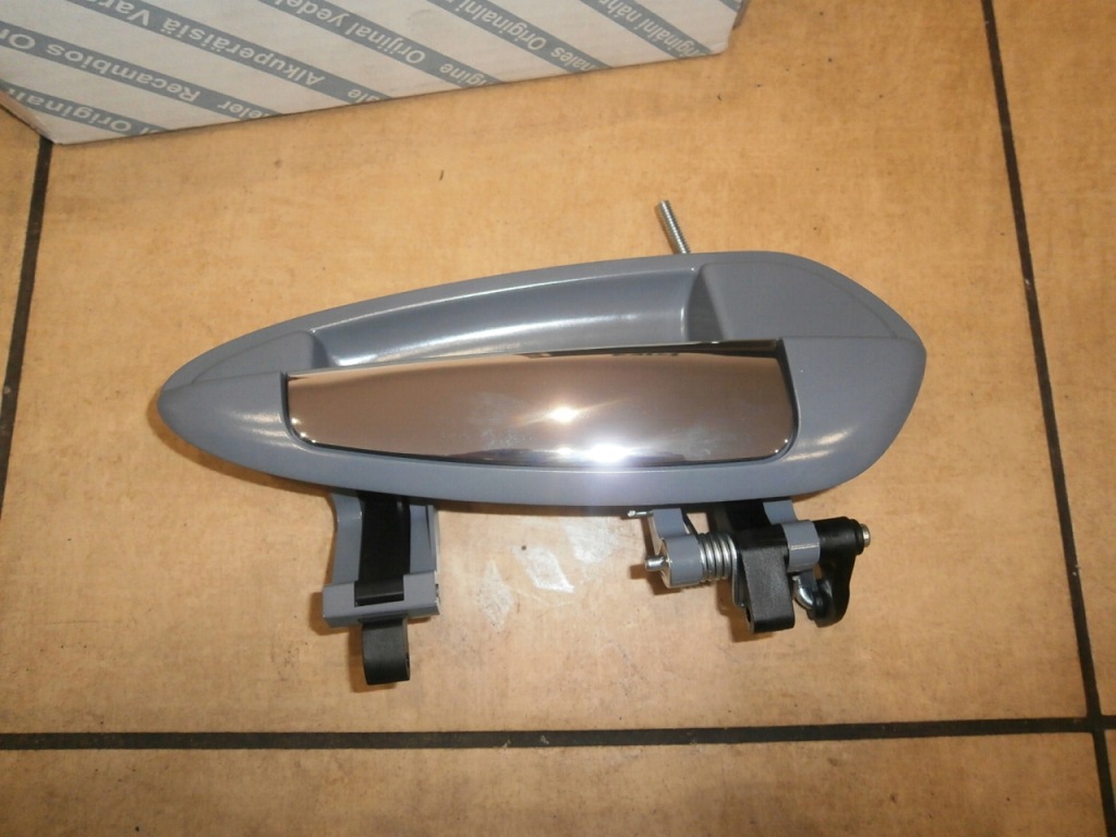 Купити Nowa oryg ручка перед права fiat linea 735499631