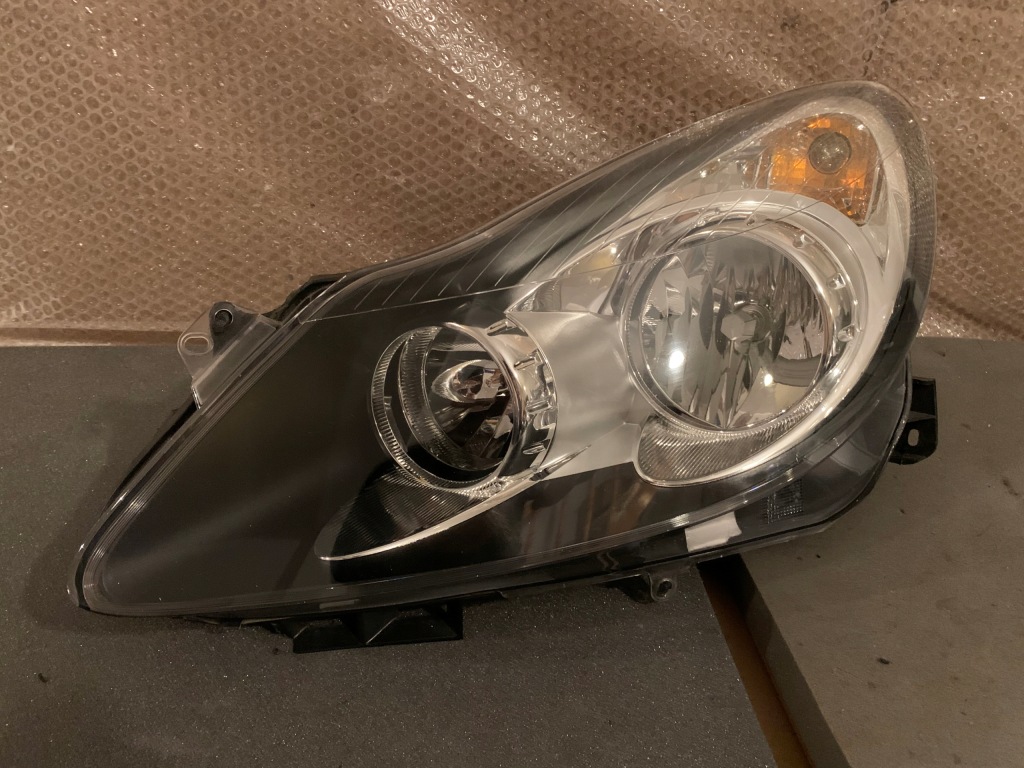 фото №1, Opel corsa d 06-11 ліва лампа перед звичайна тонована