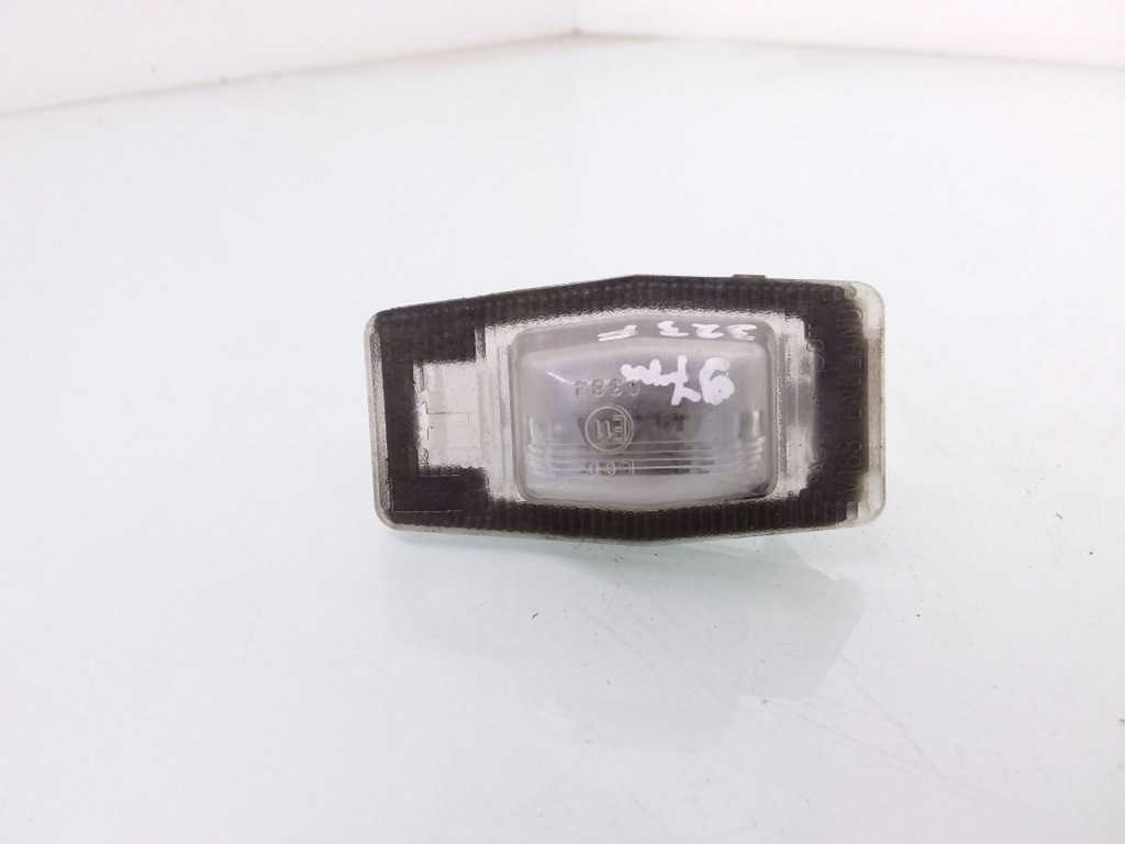 фото №1, 2000 mazda 323 f лампа номерного знака реєстраційний v183