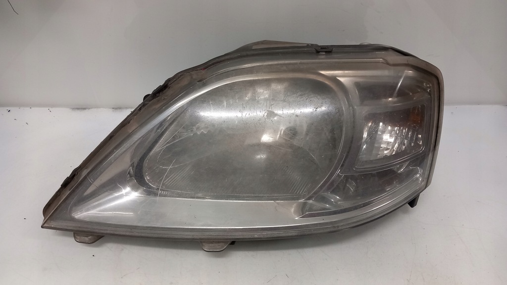 фото №1, Лампа передняя левая dacia logan