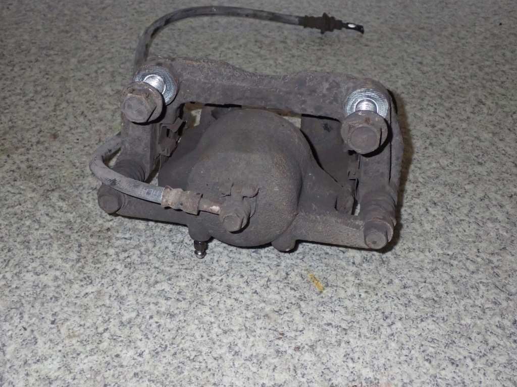 фото №5, Nissan xtrail x-trail t31 супорт передній правий