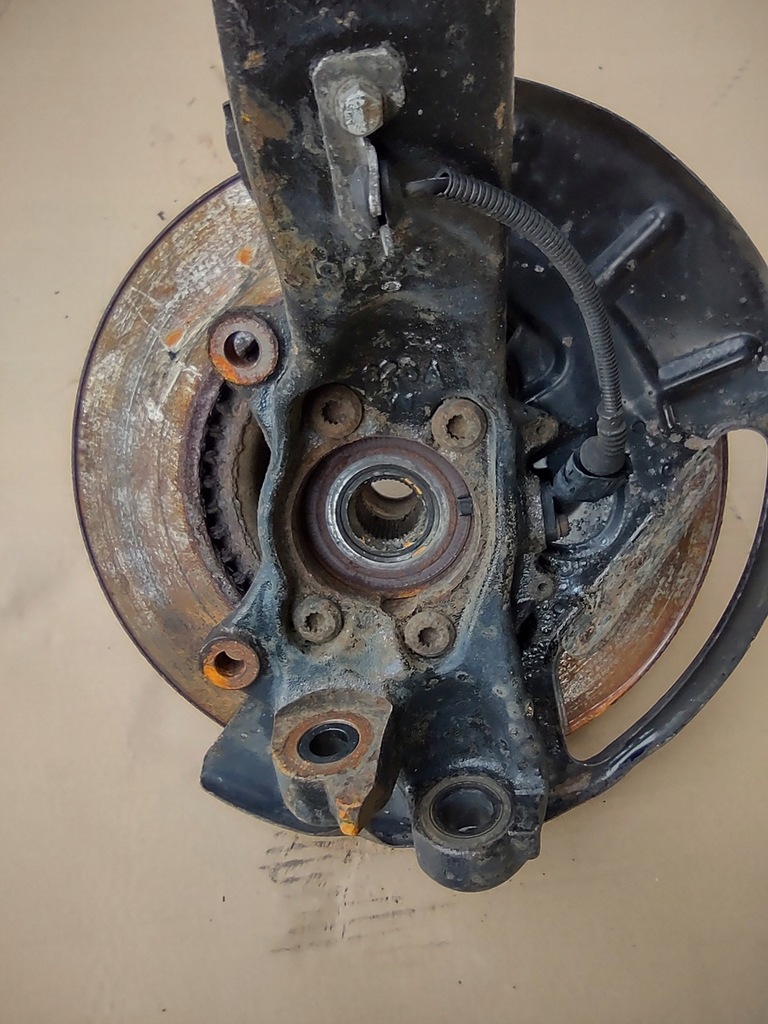 фото №7, Поворотный кулак ступица левый перед vw phaeton 3d0407257e