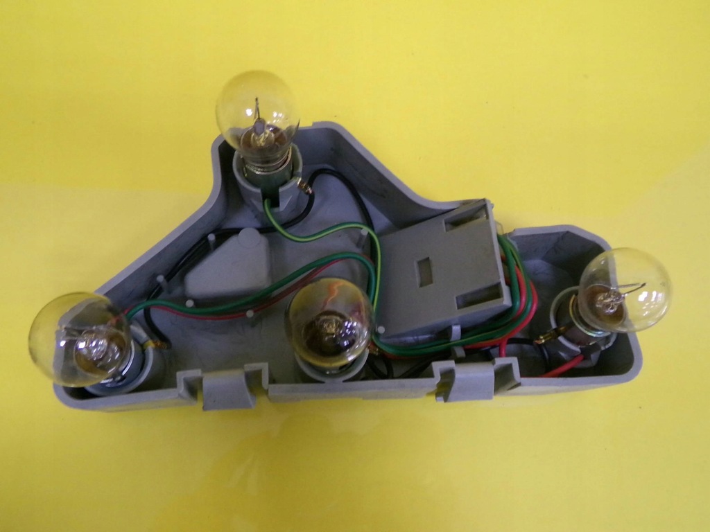 фото №1, Вкладиш лампи лівий задня mazda 121 nr596