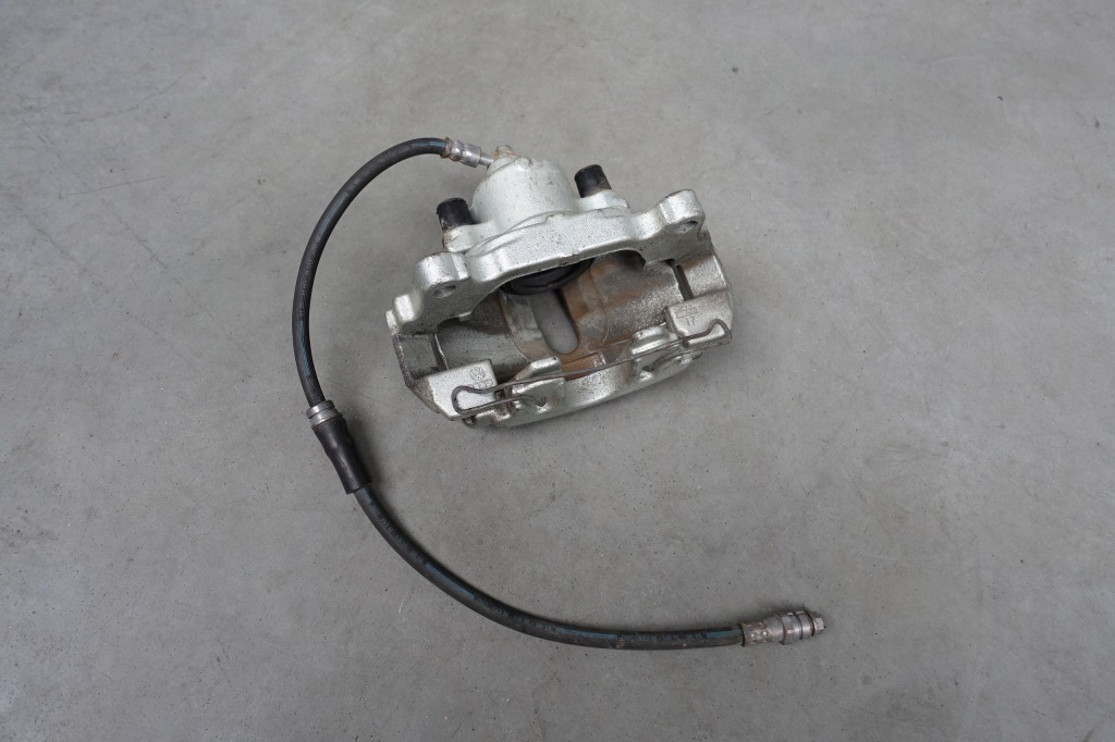 фото №1, Vw beetle 5c супорт гальмівний лівий