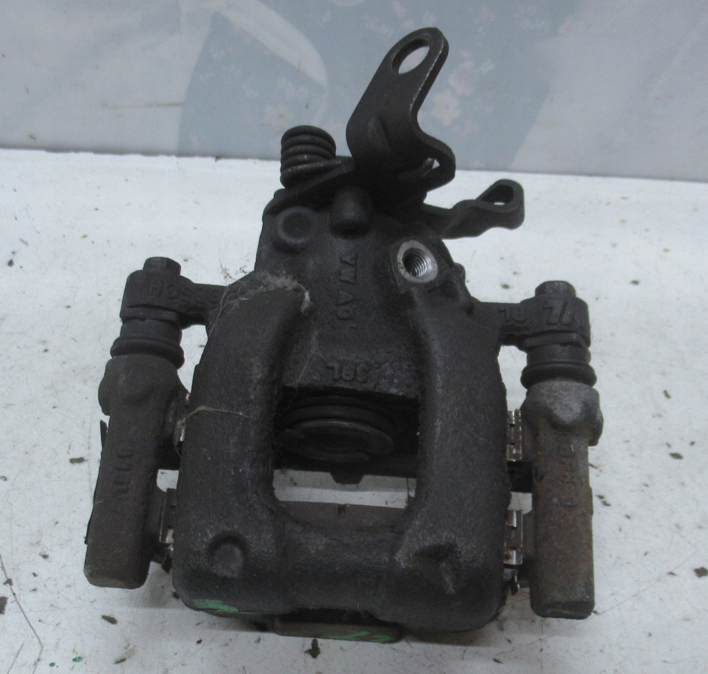 фото №1, Vw golf vi 1.6 tdi суппорт тормозной левый задняя