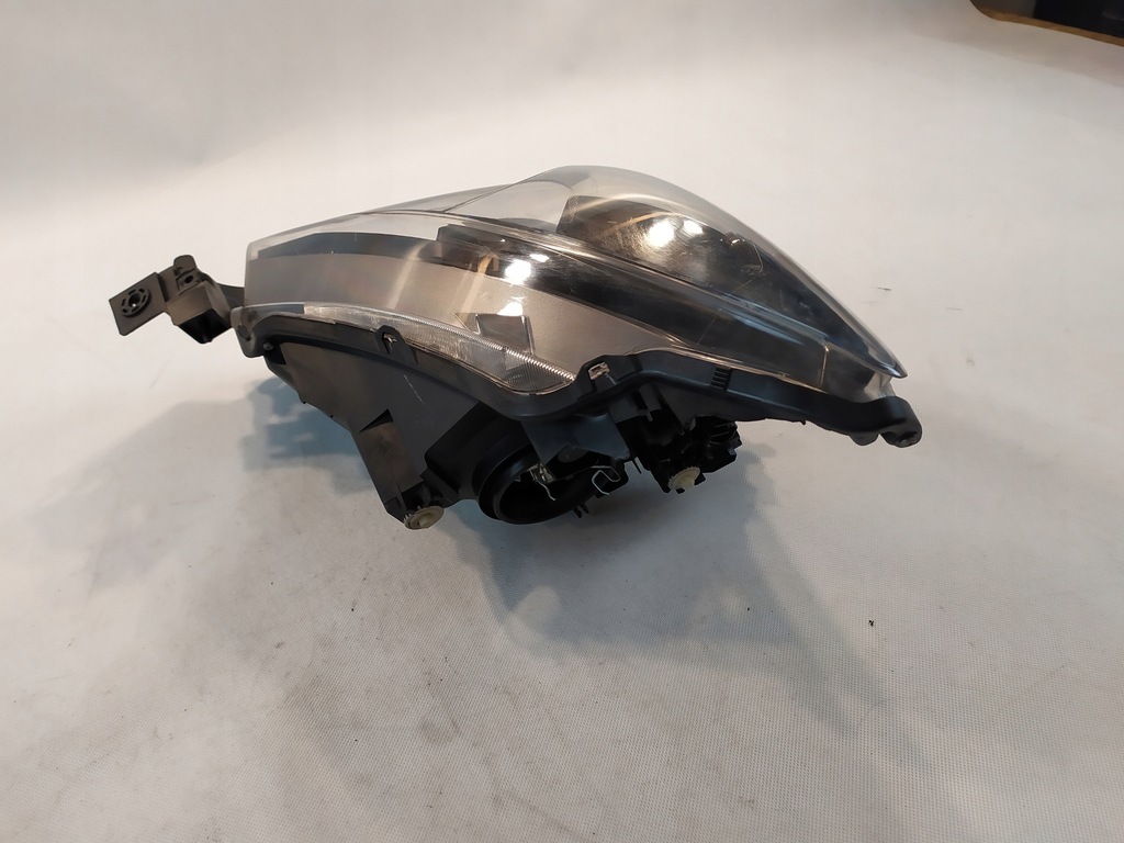 фото №6, Mazda оригинальный номер db5j-51030 лампа фара