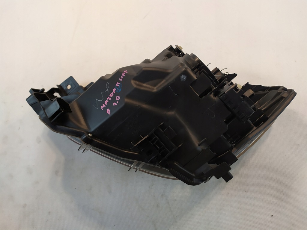 фото №9, Mazda оригинальный номер db5j-51030 лампа фара