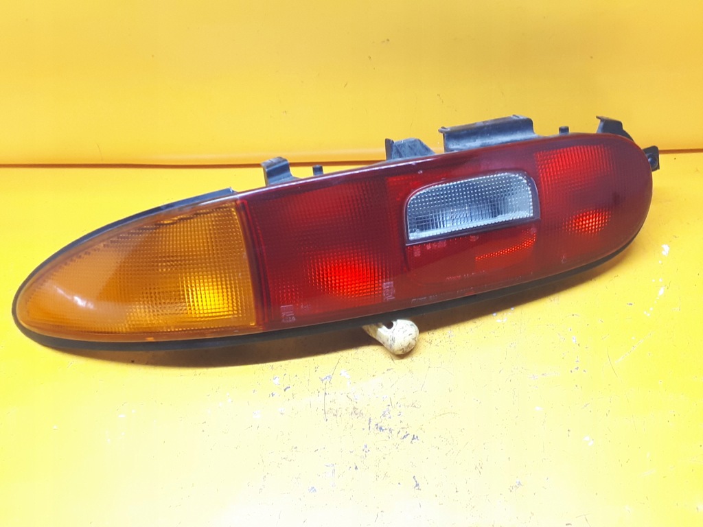 фото №4, Лампа задняя левая mazda mx3 91-98r kotto