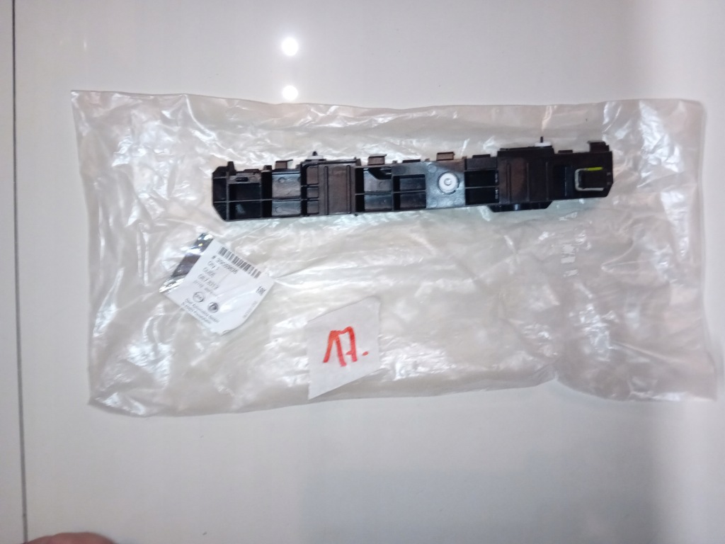 фото №1, Corsa e 39059833 напрямна бампера лівий задня