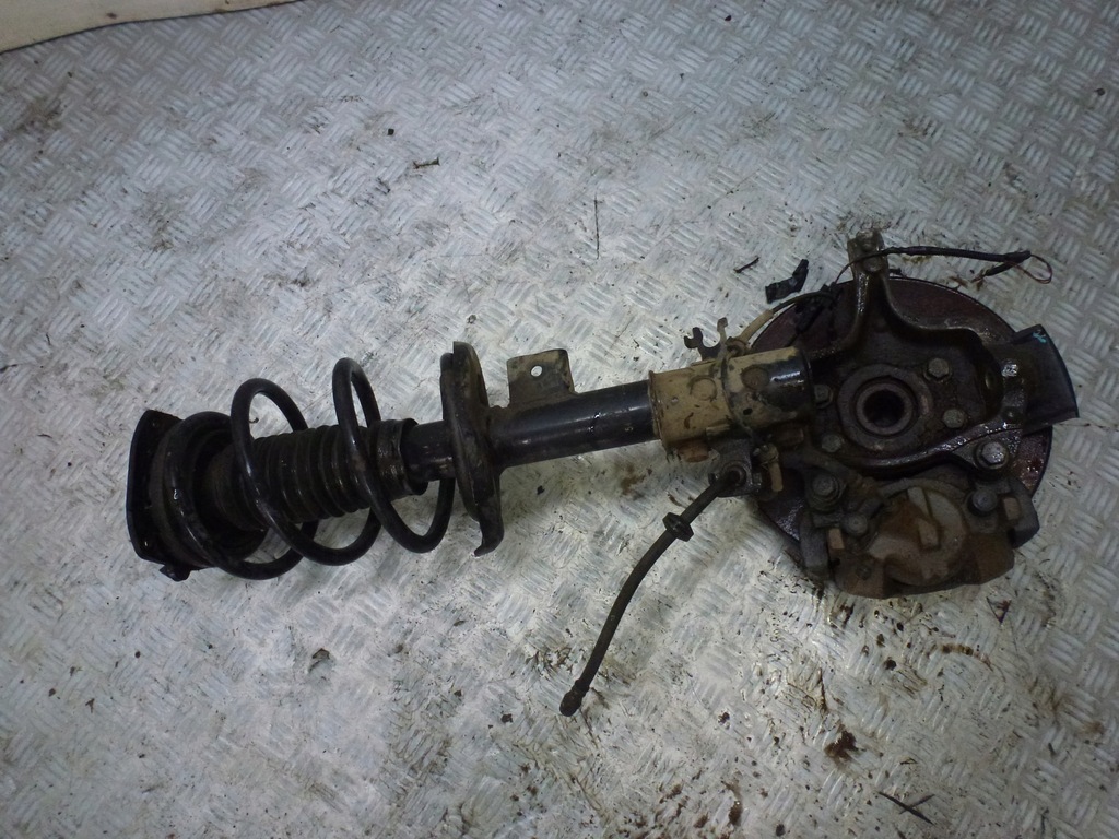 фото №4, Поворотный кулак амортизатор правый перед latitude kpl