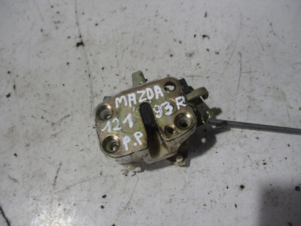 фото №1, Замок двері передній правий mazda 121 93r