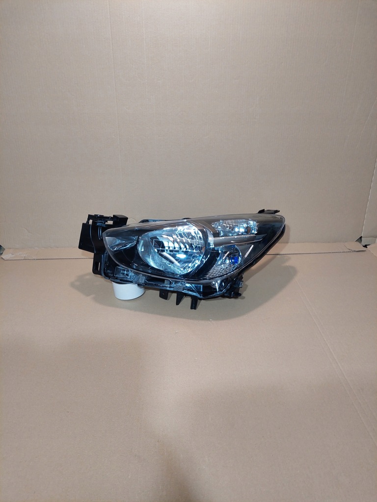 фото №1, Mazda ii 14r dj. лампа левая перед