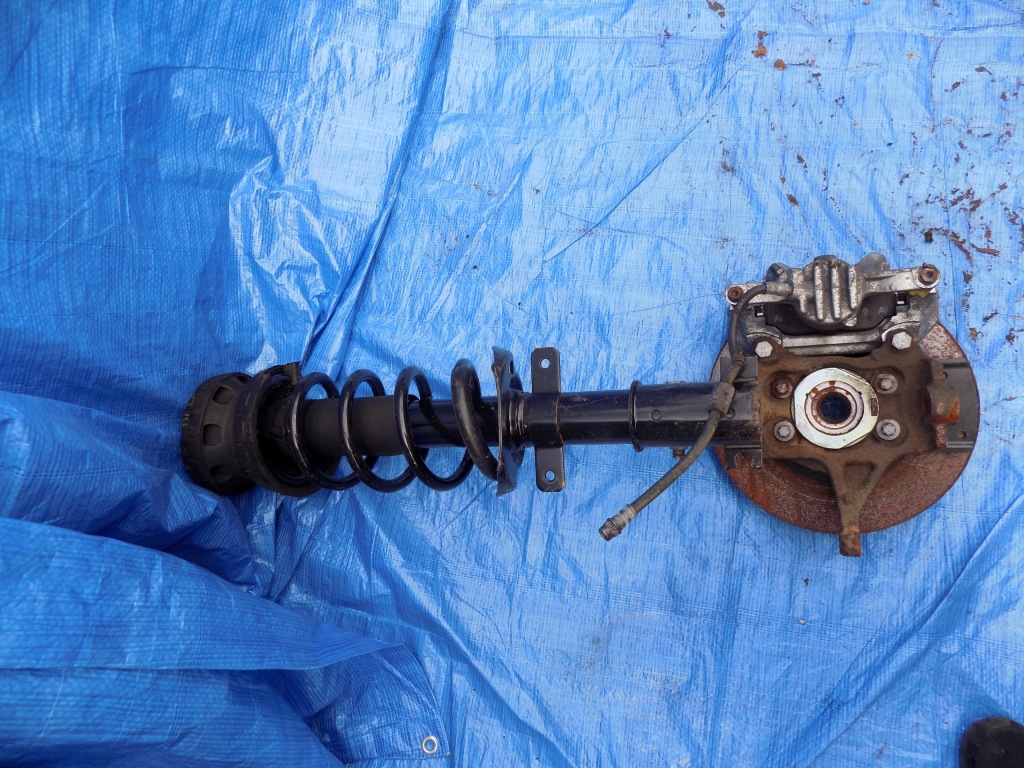 фото №3, Поворотний кулак амортизатор лівий перед trafic iii