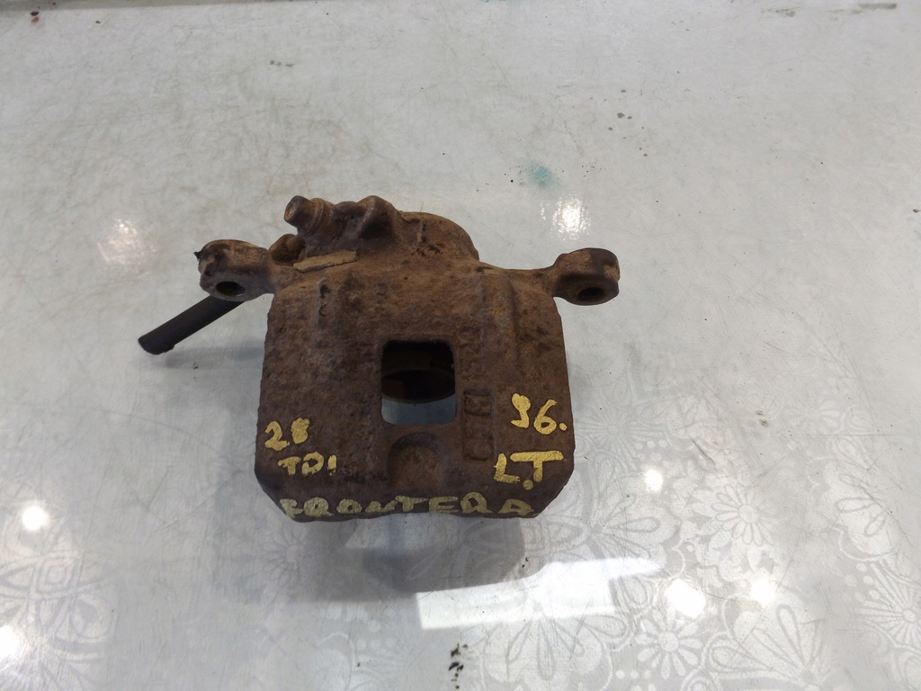 фото №1, Frontera a 2,8td суппорт левый задняя