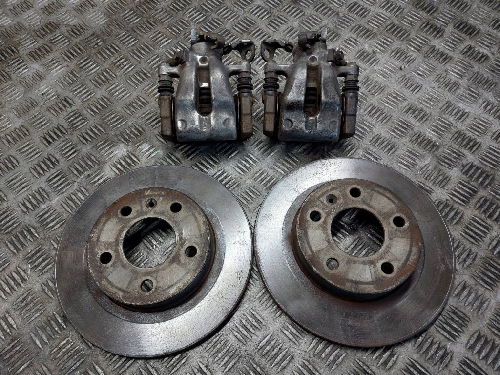 Купить Тормозные диски тормозные задний  + тормозные колодки + суппорты opel zafira b astra h