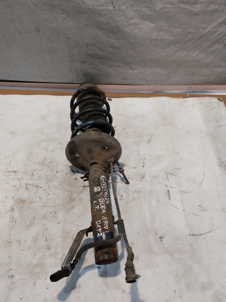 фото №1, Амортизатор пружина лівий перед vw bora 1.9tdi