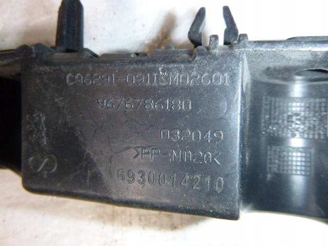 фото №3, Peugeot 301 ліва кронштейн напрямна лівий бампера задня