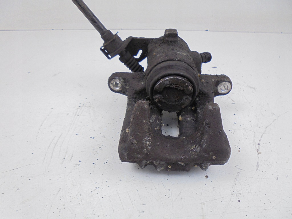 фото №5, Суппорт тормозной левый задняя skoda roomster