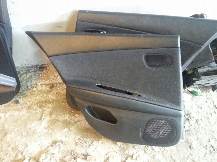 фото №1, Nissan primera p12 - обшивка лівий задня