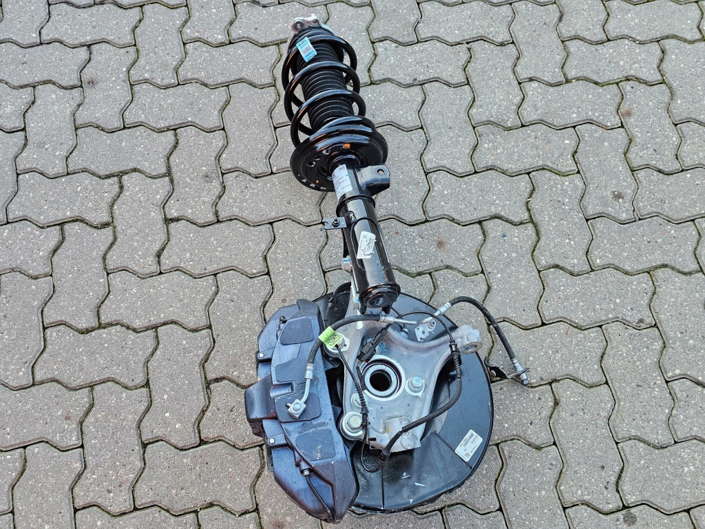 Cadillac optiq амортизатор ступиця поворотний кулак перед правий 85778723 Оригінал