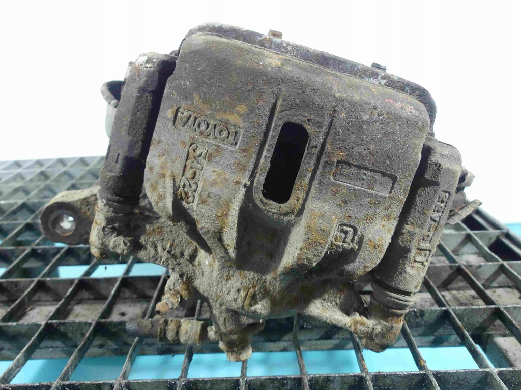 фото №1, Суппорт перед левый toyota corolla e10 1.4 16v