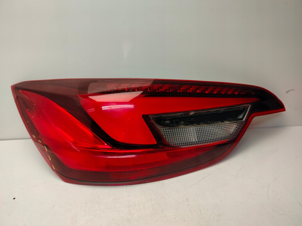 Купить Opel cascada 13r- лампа левый задний  левая задняя 13369245