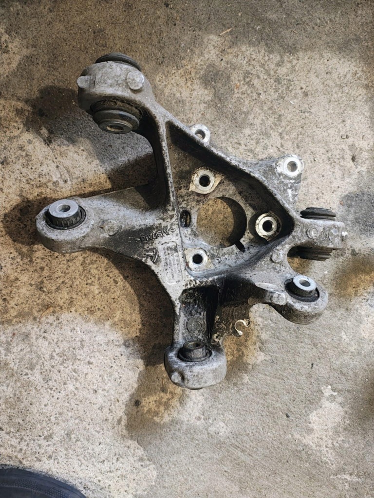 Купить Поворотный кулак левый задний  tesla 3 1044411-00-g оригинал