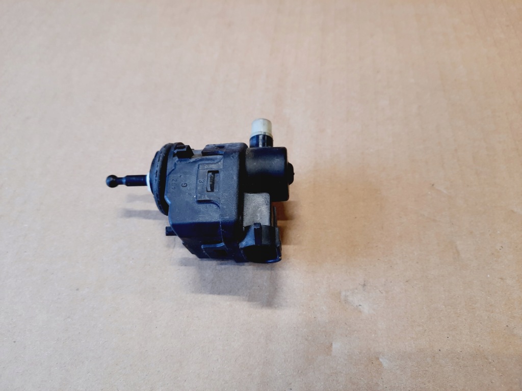 фото №1, Renault clio ii моторчик регулювання лампи 7700420737