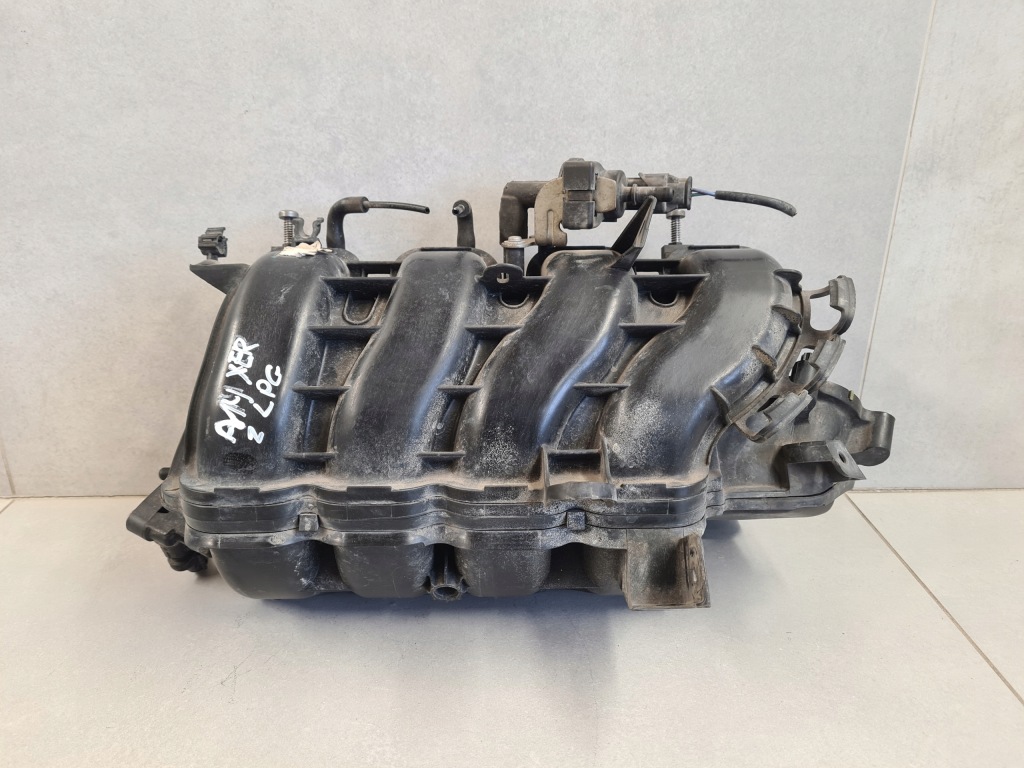 Купити Колектор впускний  1.4 a14xer 100km lpg gaz opel adam