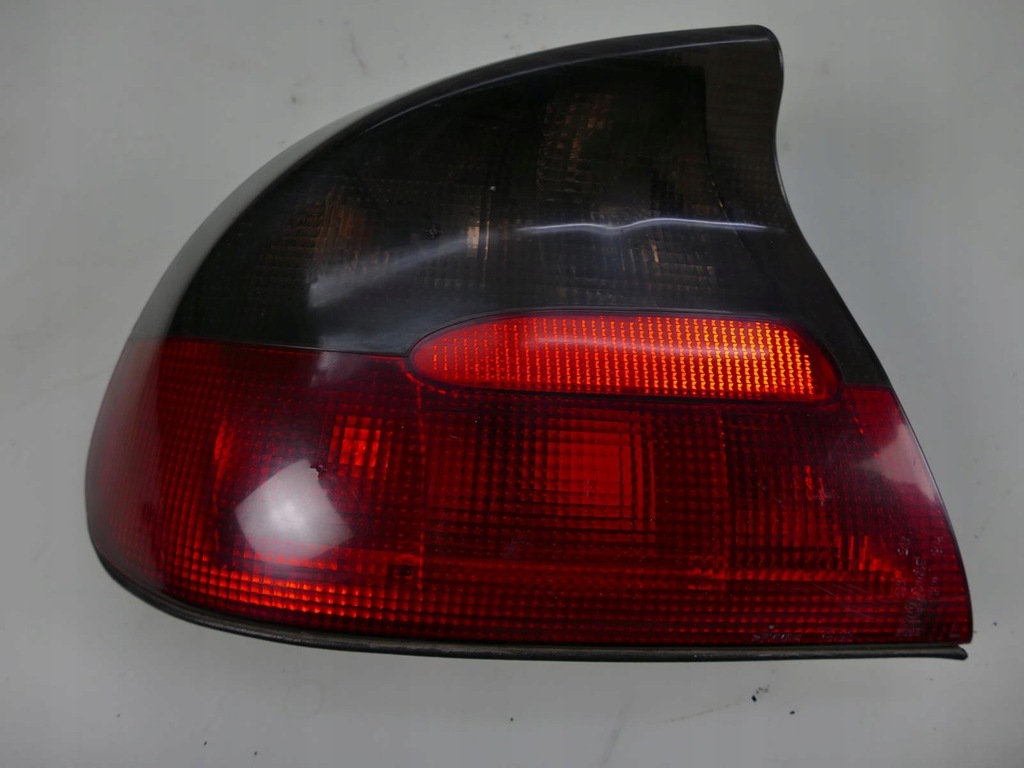 фото №1, Opel tigra a лампа левый задняя левая задняя