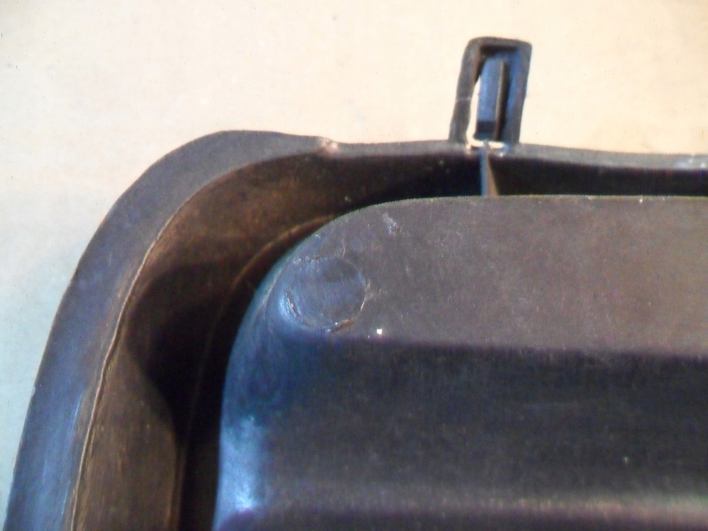 фото №10, Mazda 323 заглушка бампера ліва