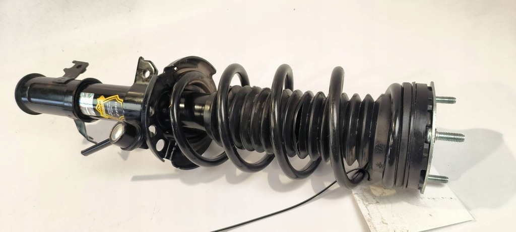 фото №7, Амортизатор правый перед 614024jp ford transit courier