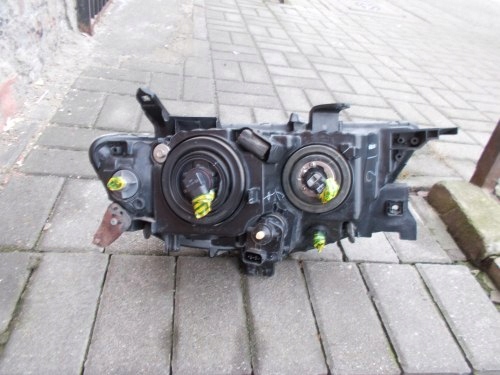 фото №9, Mitsubishi pajero sport l200 лінза h7 ліва передня лампа оригінал