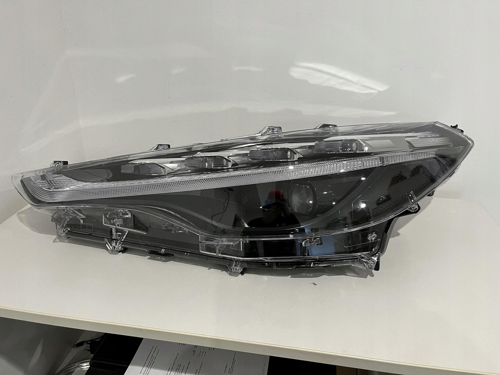 фото №1, Toyota corolla e21 cross лампа левый перед hasco 16-184