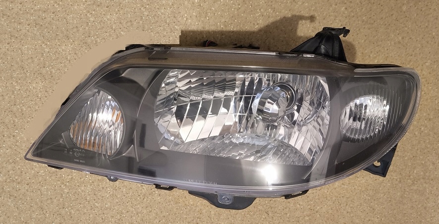 Mazda 323f bj рестайлінг  фара лівий 176 Доставка