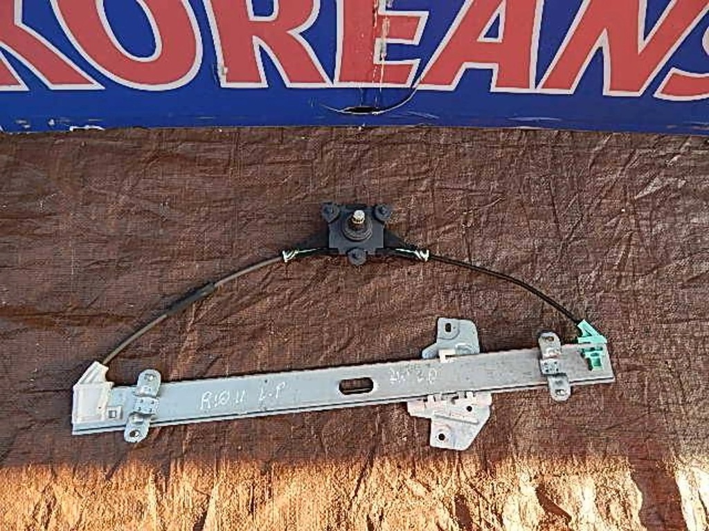 фото №1, Подъемник стекло левый перед kia rio ii 05-11