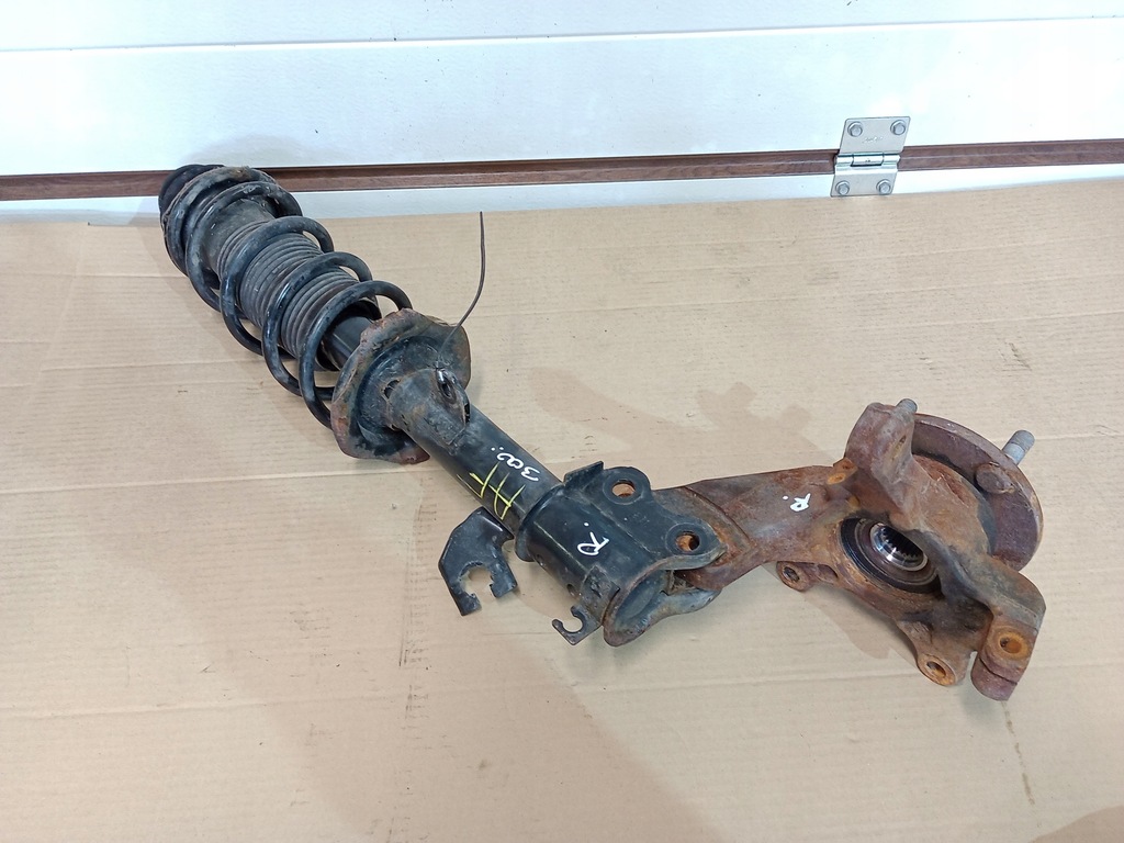 фото №1, Nissan note ii e12 1.2 амортизатор ступиця права