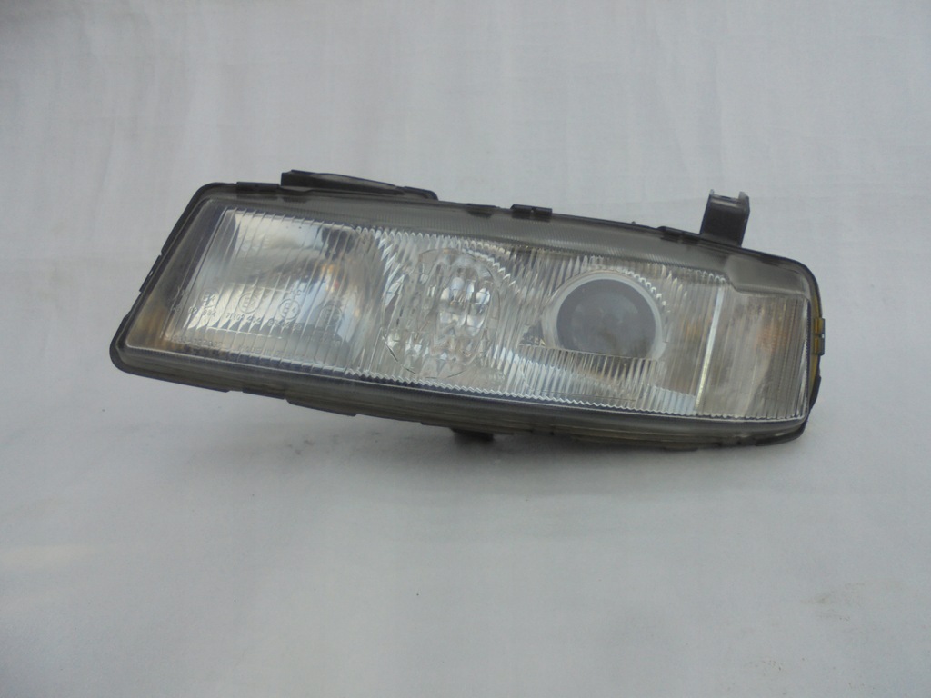 фото №10, Фара лампа левая правая opel calibra hella 1x линза ladne slask europ