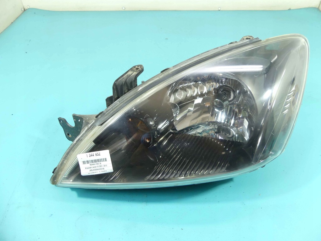 фото №1, Фара левый лампа перед mitsubishi lancer vii europa