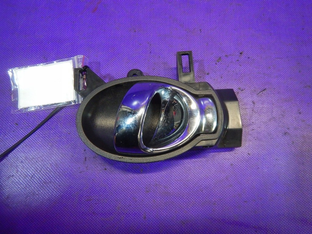 фото №1, Juke 09- ручка внутрішня перед ліва передня