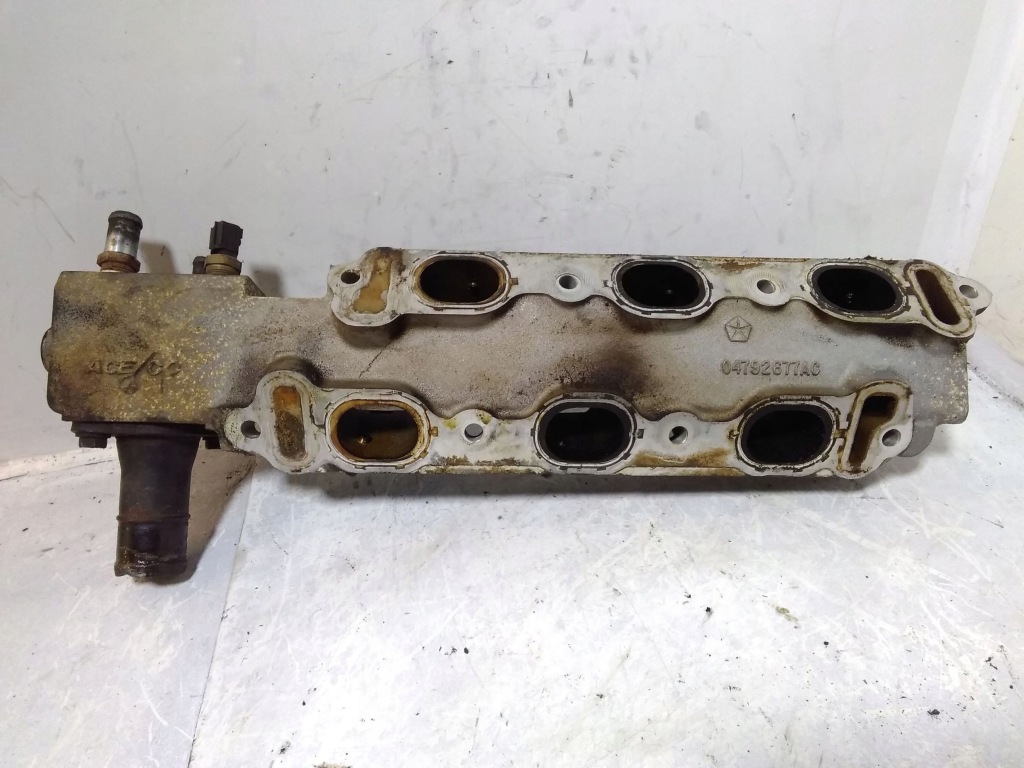 Купити Колектор впускний  chrysler pacifica 04792677ac