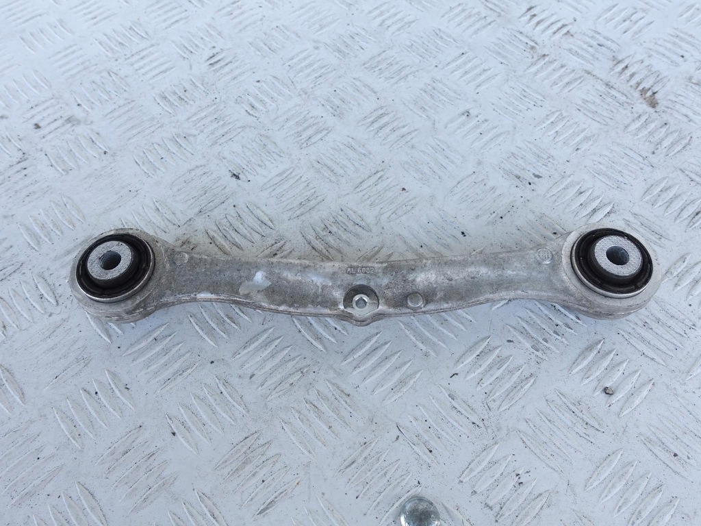 фото №1, Tesla 1027421-00-e рычаг верхний задний p