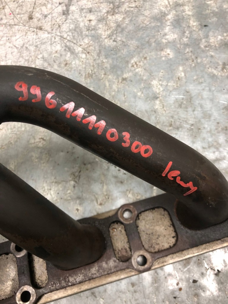 Колектор випускний лівий porsche 986 2.7 99611110300 Зі Шроту