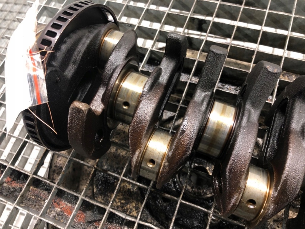 Wał коленчатый opel corsa d 1.4 100km 55561516 06-14 в Украине