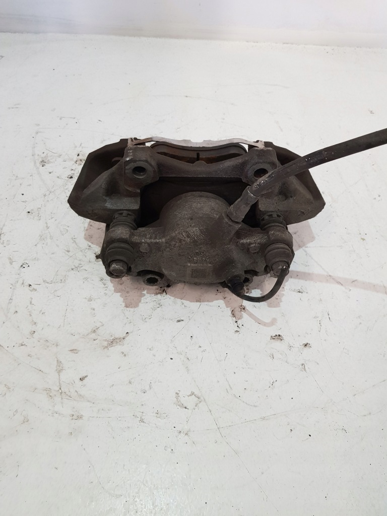 Купить Суппорт тормозной правый перед 322x32 mercedes w207