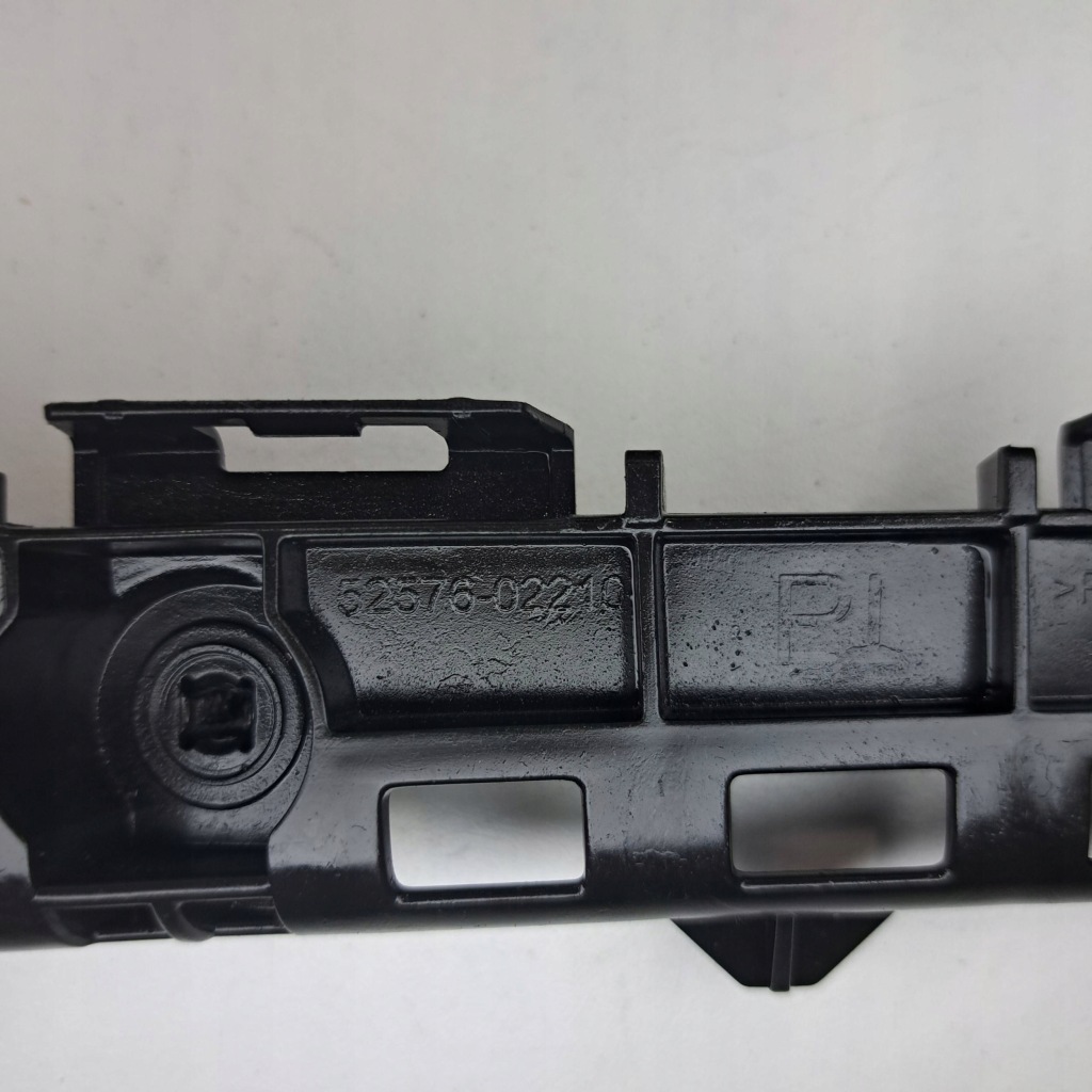 фото №7, Toyota corolla e210 e21 левый кронштейн кронштейн бампера заднего 52576-02210